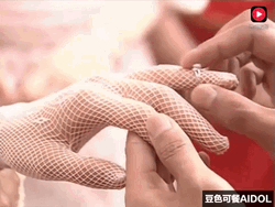 Putting Wedding Ring GIF