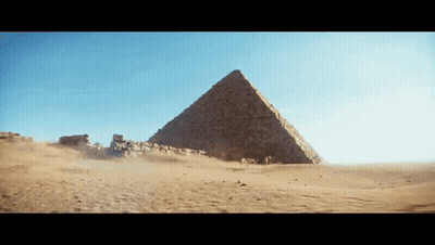 Pyramid In Desert With Dust GIF