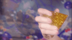 Pyramid Yellow Glitter Bomb GIF