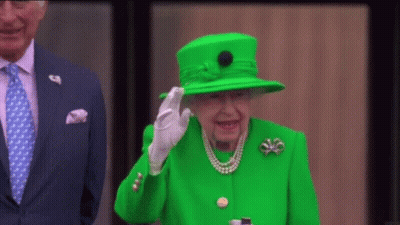 Queen In Green Hat And Coat GIF