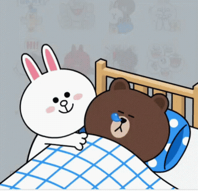 Rabbit And Brown Bear Lying In Bed GIF
