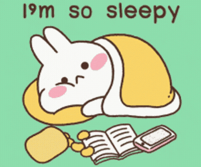 Rabbit Laying Under Blanket Saying I'm So Sleepy GIF