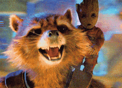 Raccoon Holding Baby Groot Smiling