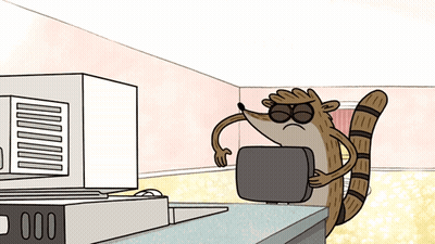 Raccoon Sitting In Front Of Computer GIF