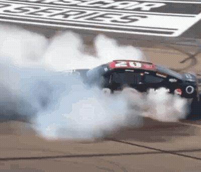 Race Car Doing Burnout With Smoke GIF