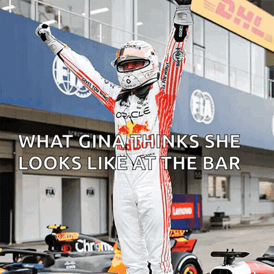Race Car Driver Arms In Air In Front Of DHL Building GIF