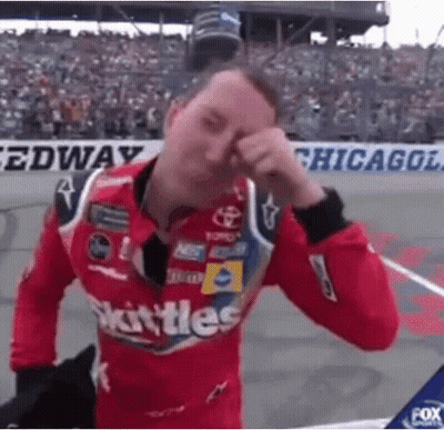 Race Car Driver Holding Checkered Flag By Lucas Car GIF