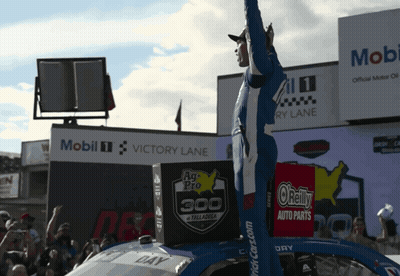 Race Car Driver In Front Of Ag Pro 300 Sign GIF