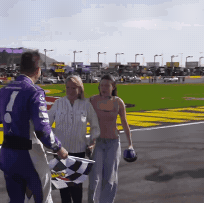 Race Car Driver In Purple Uniform Number 7 GIF