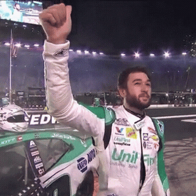 Race Car Driver In Unit FIP Jacket Fists GIF