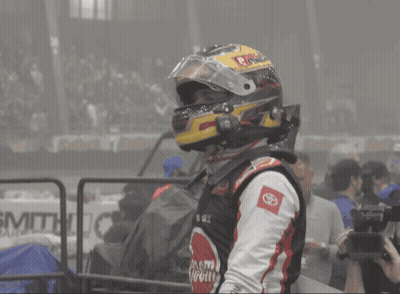 Race Car Driver Wearing Reem Jersey GIF