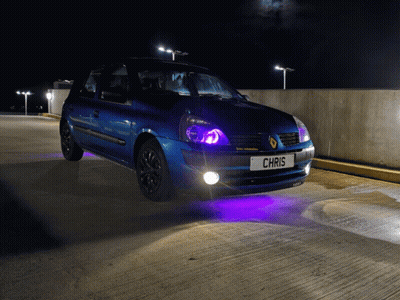 Race Car Driving By Planet Air Building GIF