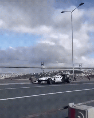 Race Car Driving On Highway GIF