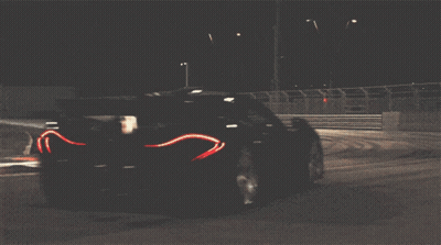Race Car Driving Past Fence Saying Pennsylvania GIF