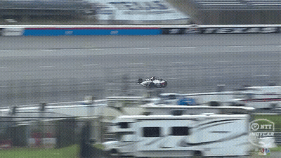 Race Car Flying Over RV IndyCar GIF