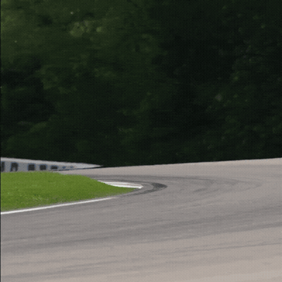 Race Car Going Around Curve GIF