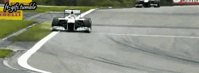 Race Car Going Around Curve F1-Gifs.tumblr GIF