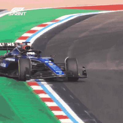 Race Car Going Around Curve With Sprint GIF