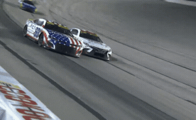 Race Car Number 99 Driving On Track GIF