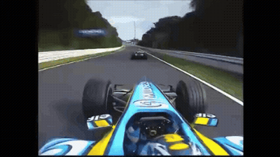 Race Car With Elf On Front GIF