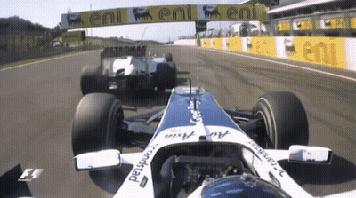 Race Car With Eni On Track GIF