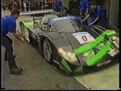 Race Car With Number 0 On Front GIF