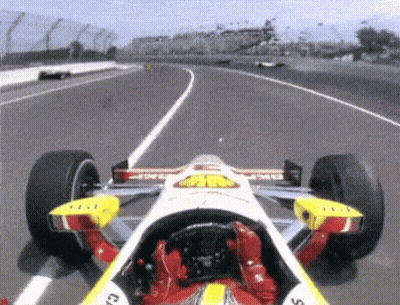 Race Car With Shell Logo GIF