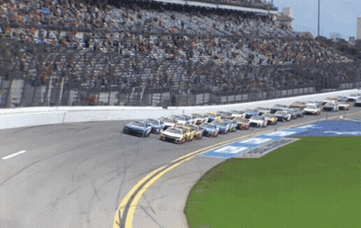 Race Cars Lined Up On Track Saying A GIF