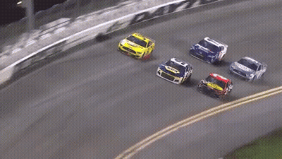 Race Cars Racing Down Track GIF
