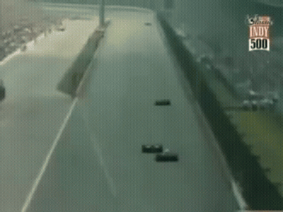 Race Cars Racing On Indy 500 Track GIF