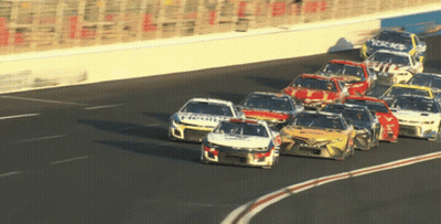 Race Cars Racing With Fireit On Side GIF