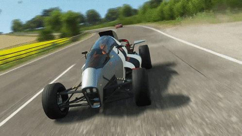 Racing Car Driving Down Road GIF