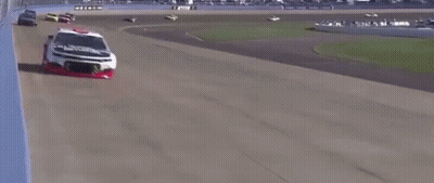Racing Cars On A Race Track GIF