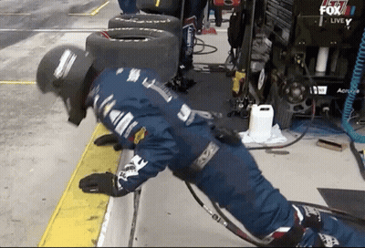 Racing Suit Man Crawling Before Fox Live Sign GIF