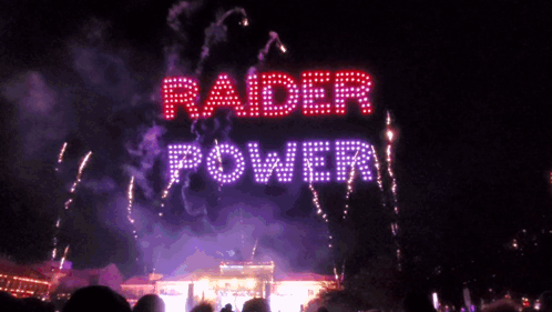 Rader Power Sign Lit Up In Night Sky GIF