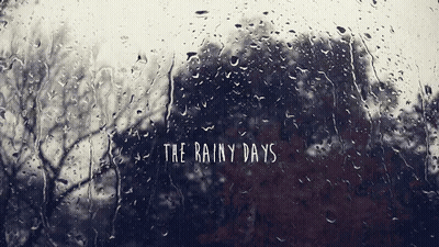 Rain Drops On Window Saying The Rainy Days GIF