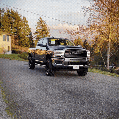 Ram Truck Parked On Gravel Road GIF