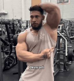 Ramon Flexes Muscle Shows Middle Finger GIF