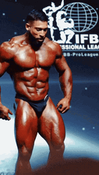 Ramon Flexes Muscles Back GIF