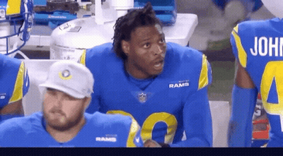 Rams Player Talking To Teammates On Bench GIF