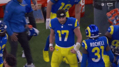 Rams Players Standing On Field GIF