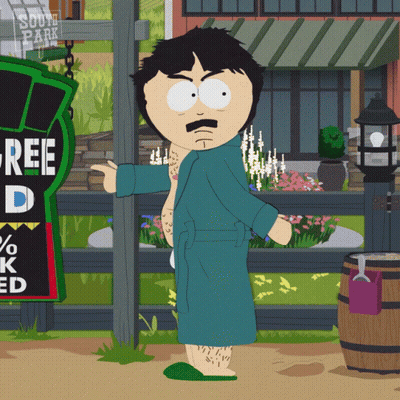 Randy From South Park Is Standing In Front Of A Sign That Says Free D. GIF