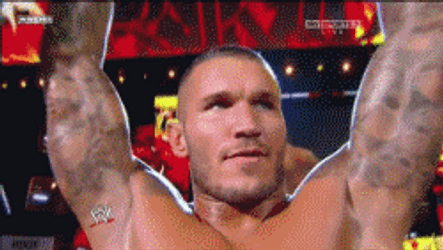 Randy Orton Arms Up Biting Lips GIF