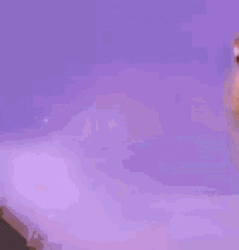 Rapper Nicki Minaj Playing Peek A Boo GIF