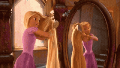 Rapunzel Brushing Hair In Front Of Mirror GIF