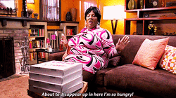 Rasputia Uneasy Sitting On Couch   GIF