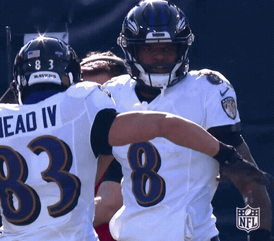 Ravens Football Players Hugging GIF