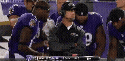 Ravens Players Huddle Around Coach GIF
