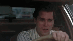 Ray Liotta Looking Up While Driving GIF