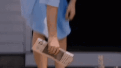 Ray Liotta Picking Up Newspaper GIF
